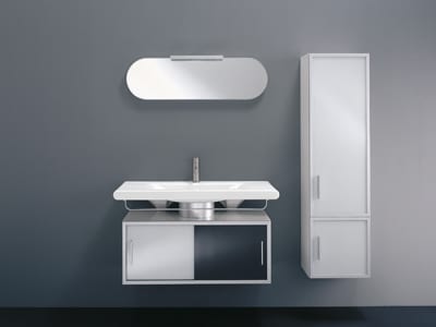 A black and white bathroom vanity with a mirror on it.