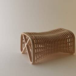 Pretzel Rattan Bench Accommodates As Many Guests As Needed