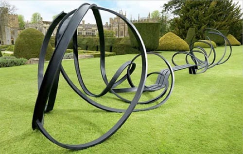 swirly black park art bench