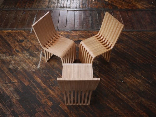 wavy wooden dining chairs