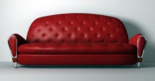 tufted red leather couch