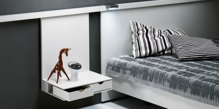 Contemporary bed and nightstands by Interluebke
