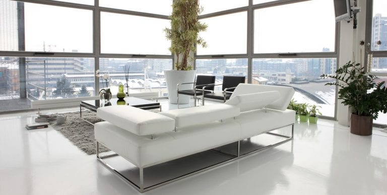 white sofa with chromed legs by Alpa Salotti