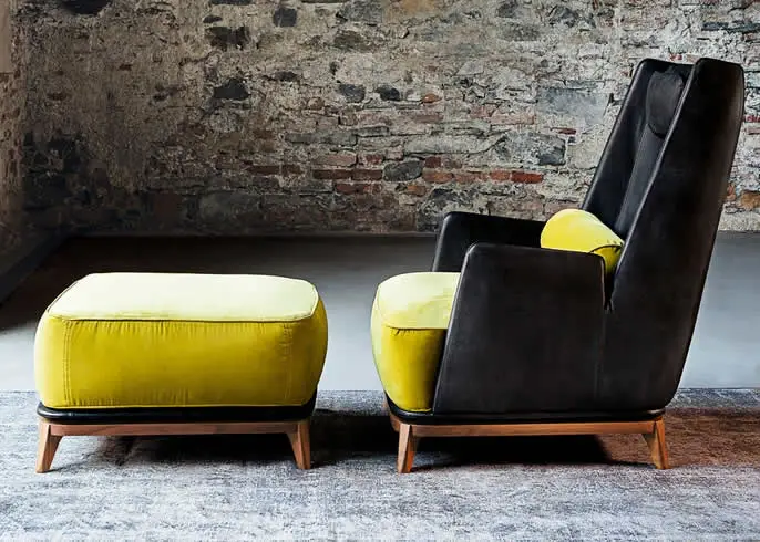 black and yellow armchair and pouf