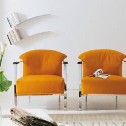 modern armchair with feather back pillow