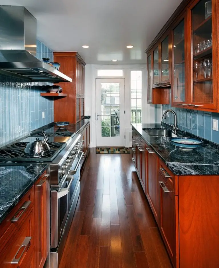 narrow kitchen design with cherry cabinets
