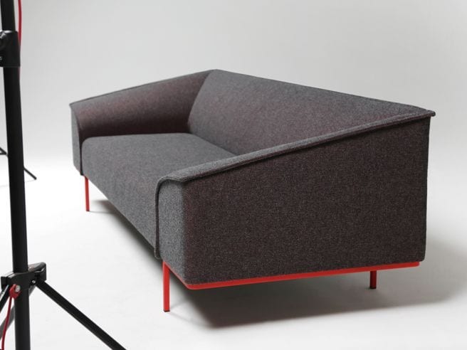 sofa with red metal legs