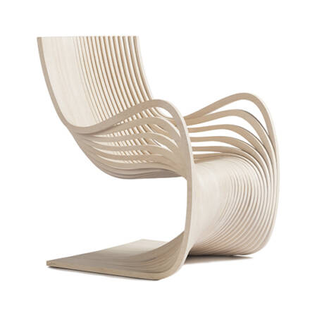 The Curved Pipo Accent Chair by Alejandro Estrada