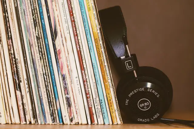  Headphones next to the records