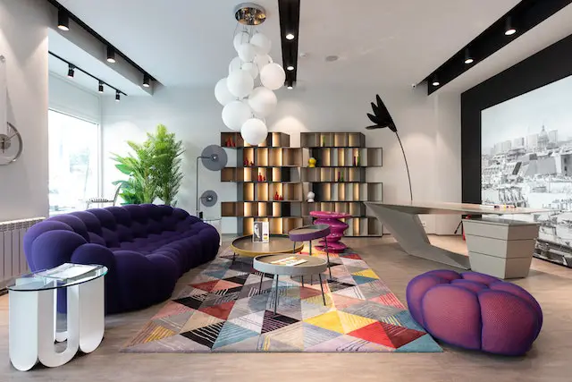 A colorful living room with different patterns and textures